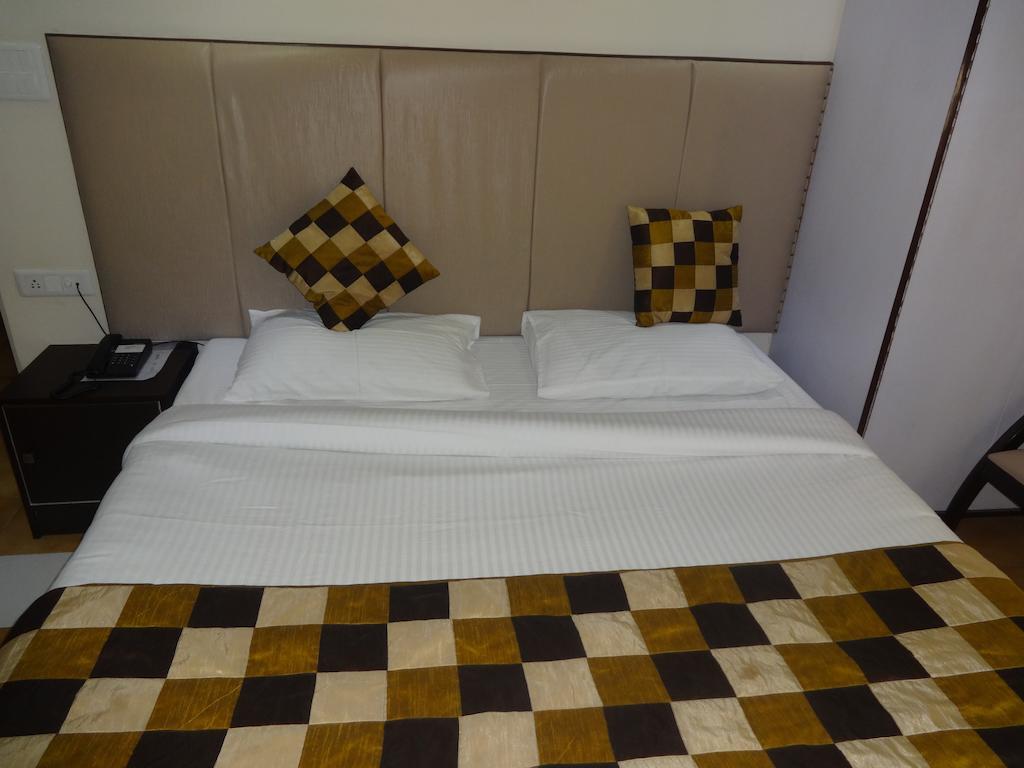 Hotel Grace Új-Delhi Szoba fotó