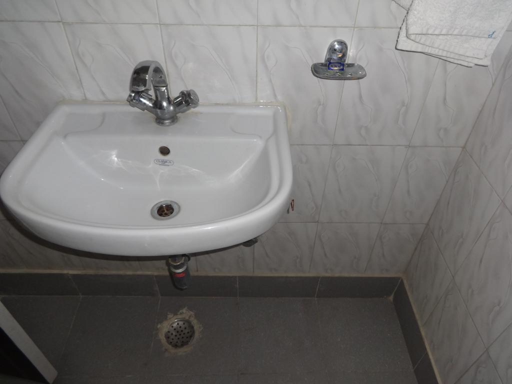 Hotel Grace Új-Delhi Szoba fotó
