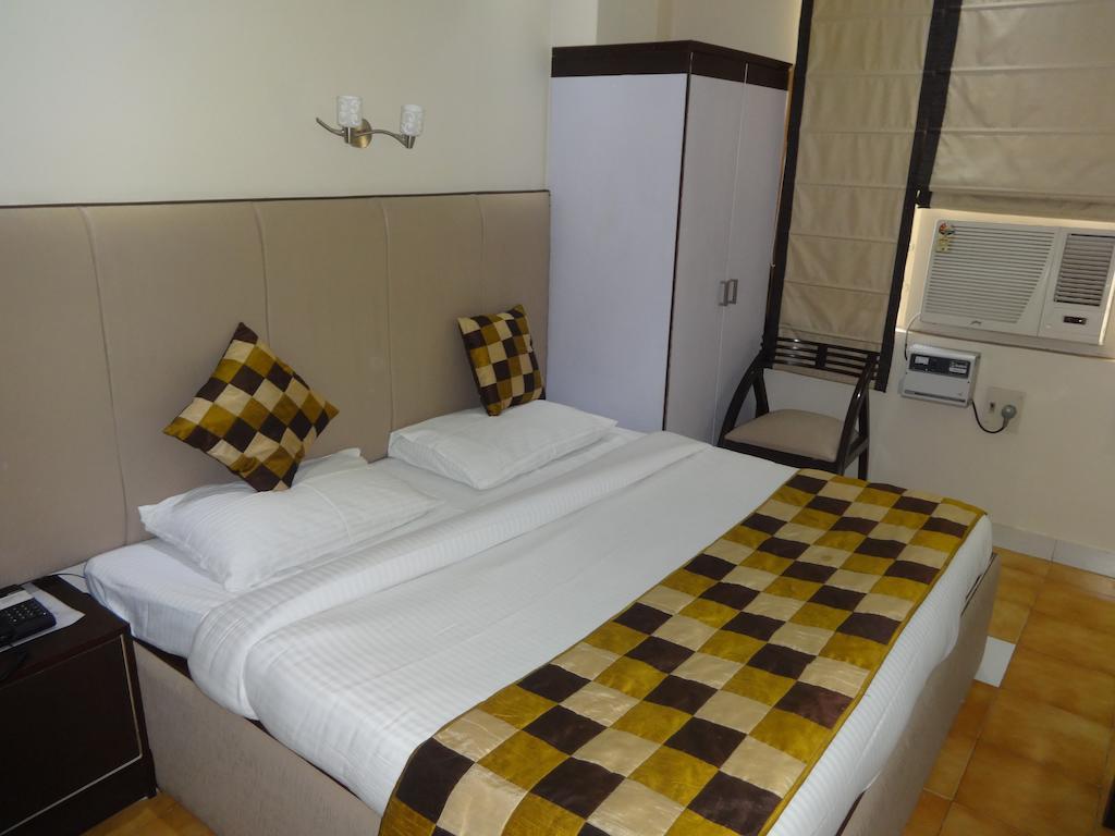 Hotel Grace Új-Delhi Szoba fotó