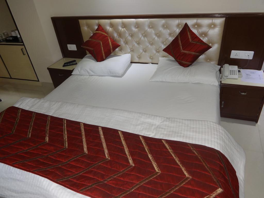 Hotel Grace Új-Delhi Szoba fotó
