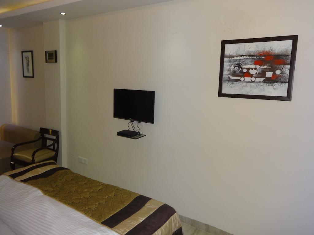 Hotel Grace Új-Delhi Szoba fotó