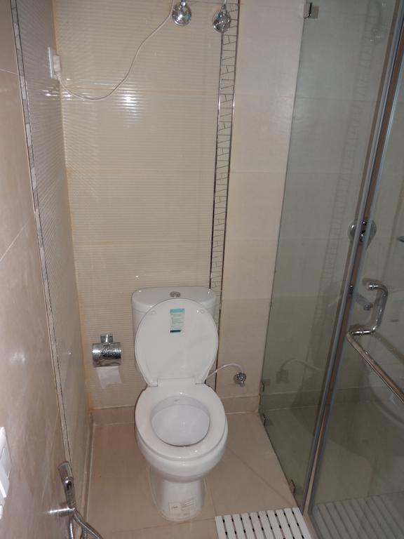 Hotel Grace Új-Delhi Szoba fotó